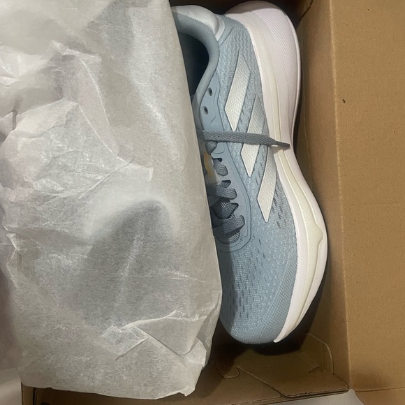 Adidas' Light Blue and White Sneakers - Picture 10 of 11